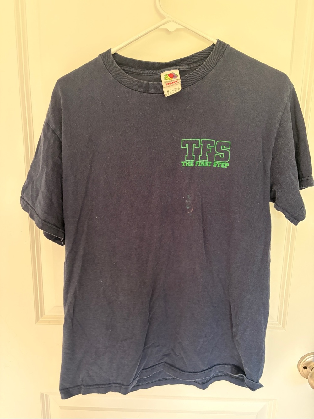 The First Step Navy Tee with Green Logo